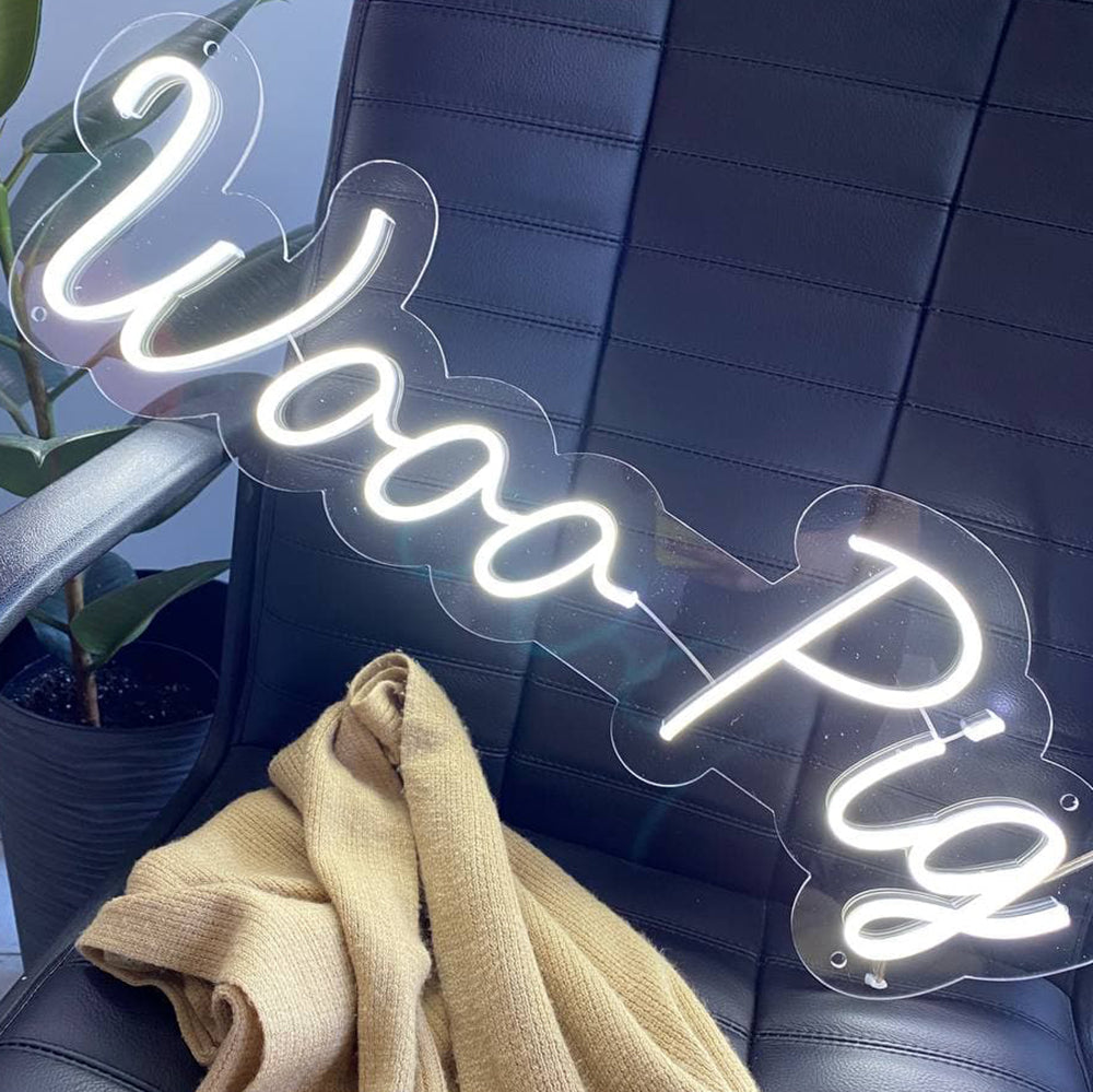 Neon sign "Wooo Pig"
