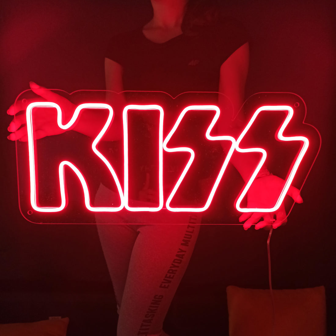 Neon sign for the rehearsal room "Kiss"